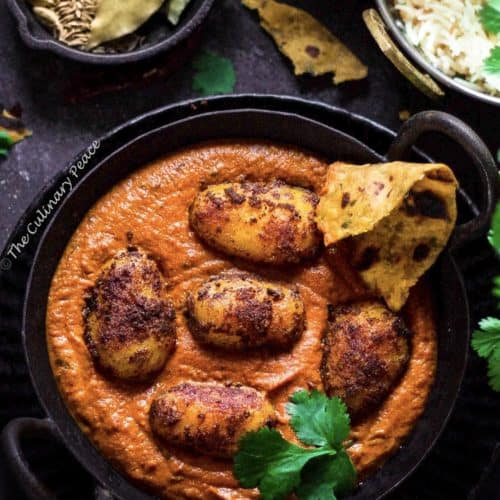 Dum Aloo is a spicy, creamy Indian curry made with baby potatoes